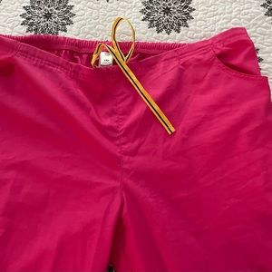 Pink scrubs. Pants are 2X petite.
